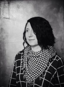 Black and white portrait of Corinne Abba