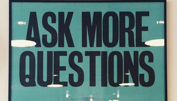Sign Saying Ask More Questions