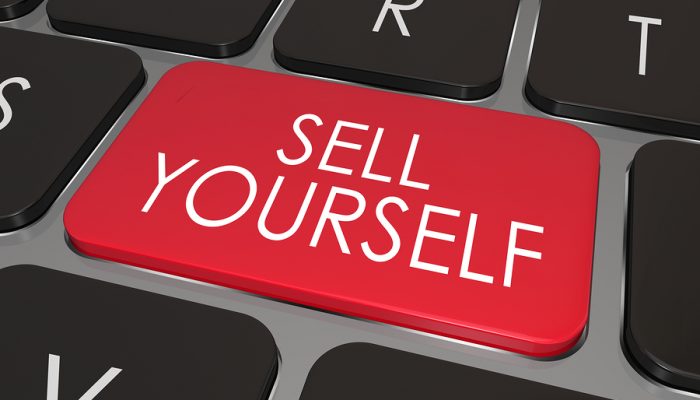 Computer Keyboard Button Saying Sell Yourself