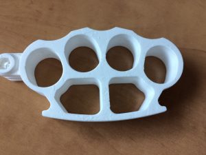 3D Printed Plastic Knuckles in White Plastic