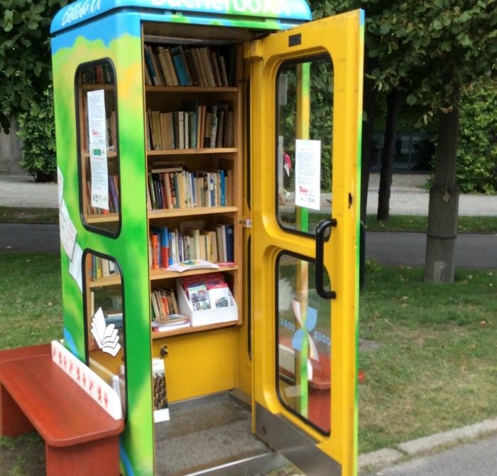 A phone booth repurposed as a library