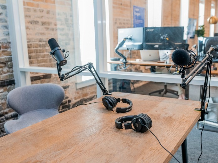 Microphone set up at a desk for recording.