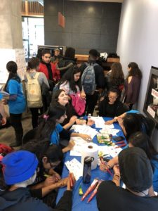 UTM Library students attending a henna workshop.