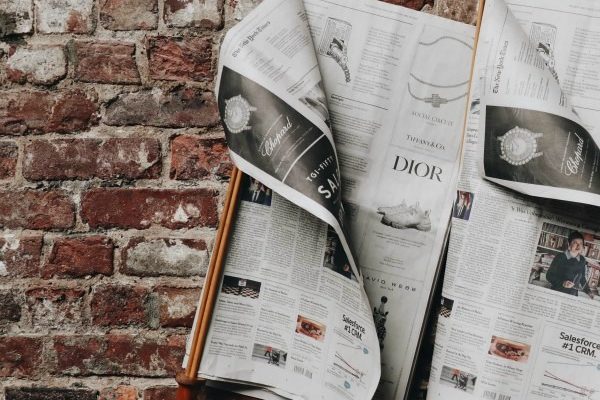 Newspapers On A Reading Wand