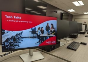 Computer screen showing a Tech Talks presentation slide